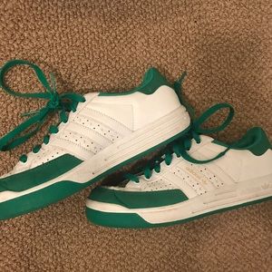 Green Adidas tennis shoes
